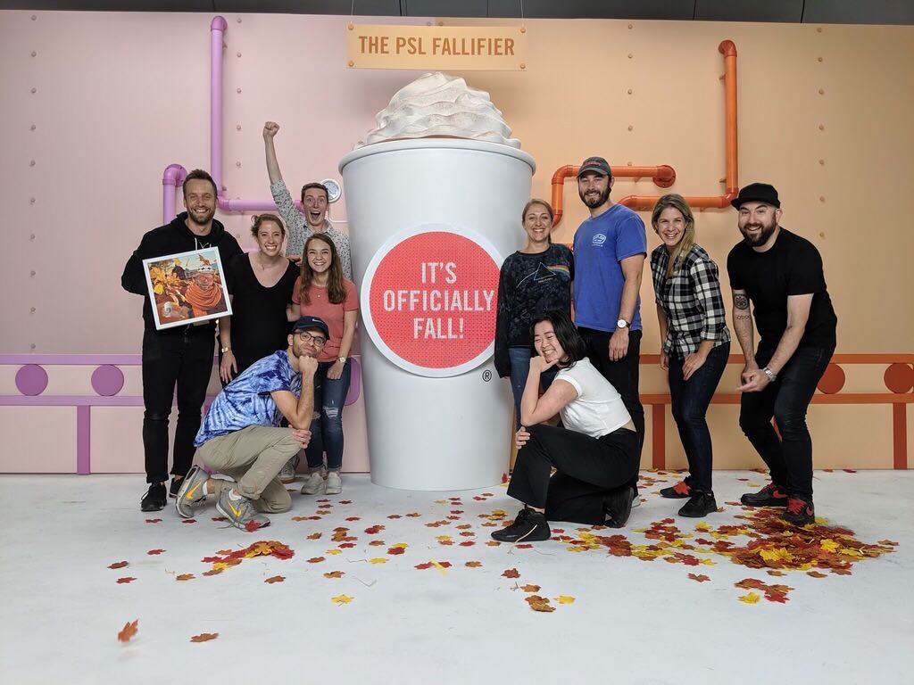 Big Spaceship team with giant PSL cup